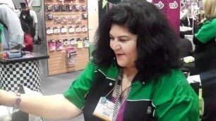 'Crafty Chica demoing our new Tulip® Fashion Glitter products at CHA Winter 2011'