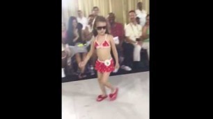 '5 year old Adory doing swimwear for the 2016 plots fashion show democracy'