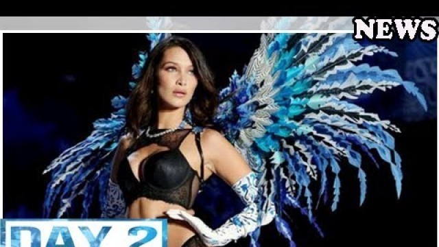 '[foto] terlalu girang saat joget, bella hadid nip slip di atas catwalk'