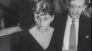 '1952 Audrey Hepburn and James Hanson attending fashion show in Rome'