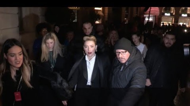 'Amber Heard creates mayhem at Giorgio Armani HC Fashion Show'